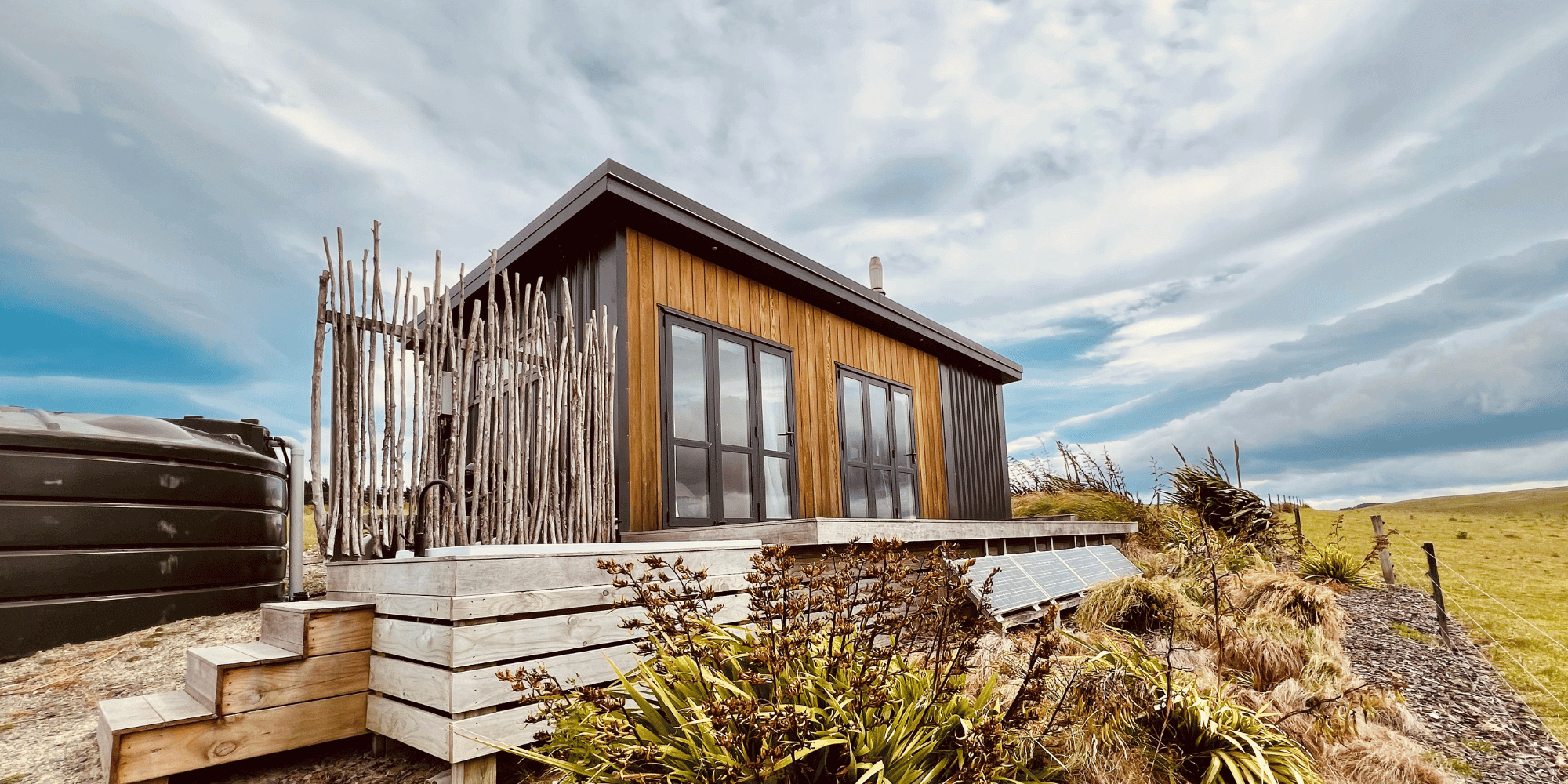 Custom cedar tiny home on a timber deck