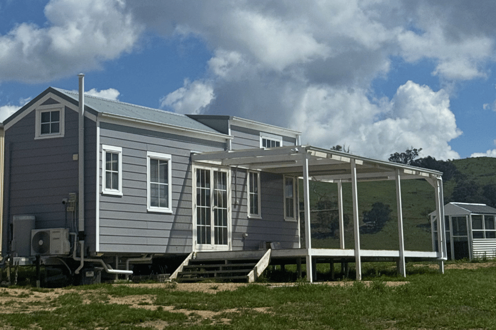 3-Bedroom Hamptons-Style Tiny Home on Wheels — 10m with Staircase - Image 1