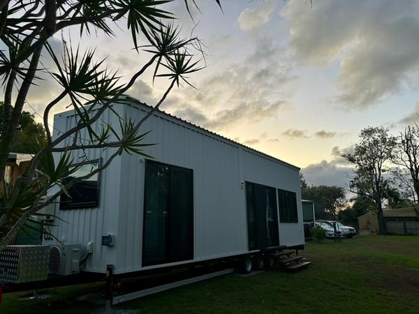 10m Tiny Home on Wheels — Ground-Floor Bedroom, Loft Sleeping + Triple Sliding Doors