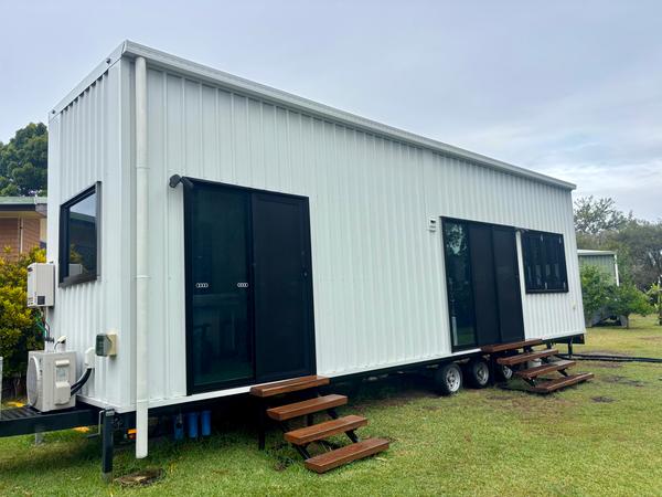 10m Tiny Home on Wheels — Ground-Floor Bedroom, Loft Sleeping + Triple Sliding Doors