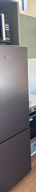 10m Tiny Home on Wheels — Ground-Floor Bedroom, Loft Sleeping + Triple Sliding Doors thumbnail 6