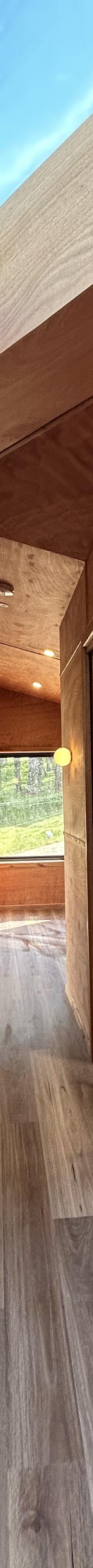 Night Sky 9m Off Grid Tiny Home on Wheels: Architect-Designed, Stargazing Apex Window & Deck thumbnail 4