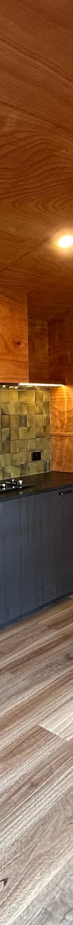 Night Sky 9m Off Grid Tiny Home on Wheels: Architect-Designed, Stargazing Apex Window & Deck thumbnail 11