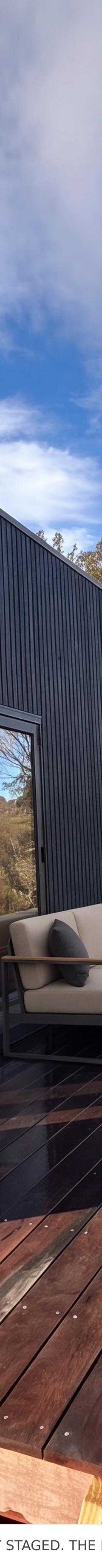 Night Sky 9m Off Grid Tiny Home on Wheels: Architect-Designed, Stargazing Apex Window & Deck thumbnail 1
