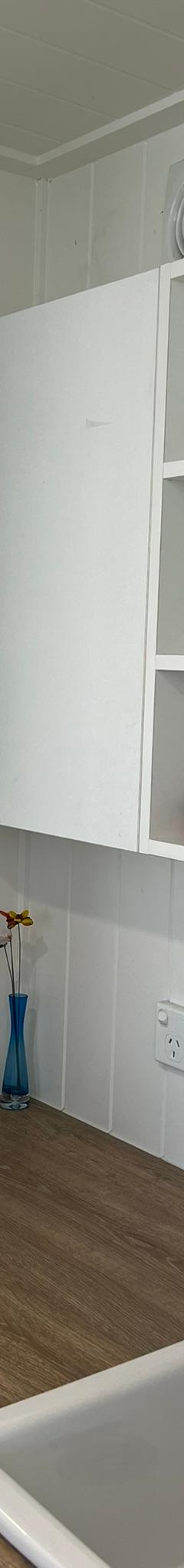 Cedar & Shale Off-Grid 9m Tiny Home on Wheels — Ground-Floor Bedroom, Gas Strut Window & White Goods thumbnail 8