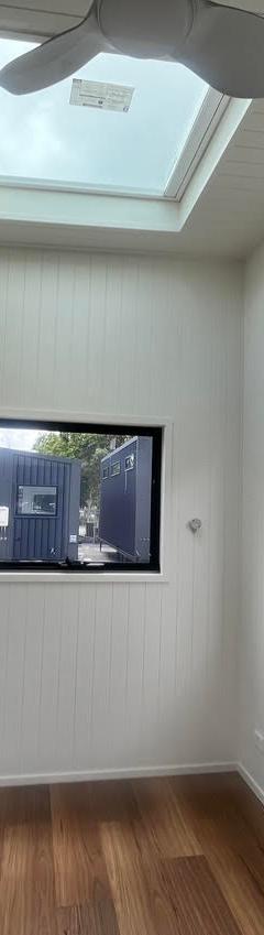 10m Tiny Home on Wheels — Ground-Floor Bedroom, Loft Sleeping + Triple Sliding Doors thumbnail 13