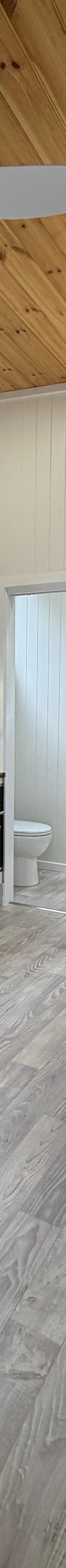 The Coastal: 3m Wide 2 Bedroom Tiny Home on Wheels, Lift-Off Trailer & Wood Fireplace thumbnail 1