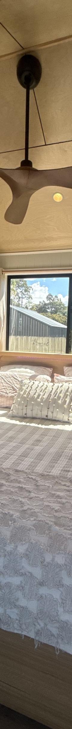 The Tallebudgera: 9.6m x 3m Tiny Home on Wheels, Ground-Floor Bedroom, Outdoor Bath and Warranty thumbnail 7