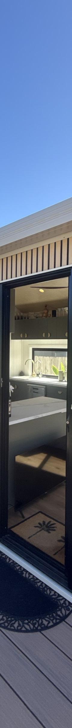 The Tallebudgera: 9.6m x 3m Tiny Home on Wheels, Ground-Floor Bedroom, Outdoor Bath and Warranty thumbnail 3