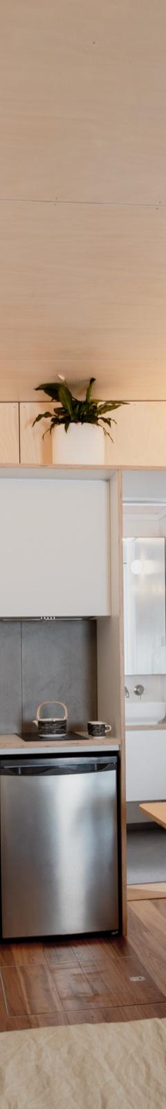 Weathertex & Cypress Batten 6m Tiny Home on Wheels: Double Glazed, Flushing Toilet & Velux Skylight thumbnail 5